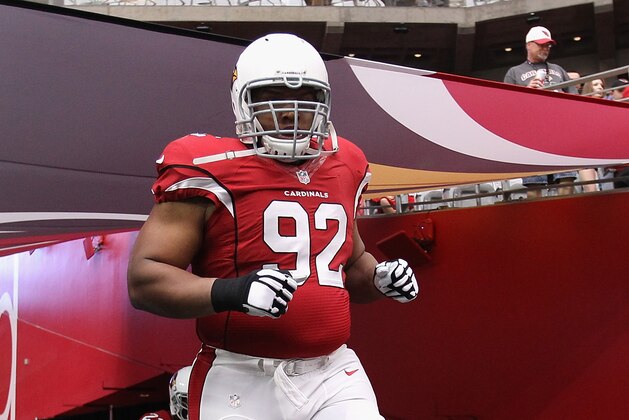 GLENDALE, AZ - OCTOBER 12:  Nose tackle Dan Williams #92 of the Arizona Cardinals runs out onto the field before the NFL game against the Washington Redskins at the University of Phoenix Stadium on October 12, 2014 in Glendale, Arizona.  The Cardinals defeated the Redskins 30-20.  (Photo by Christian Petersen/Getty Images)