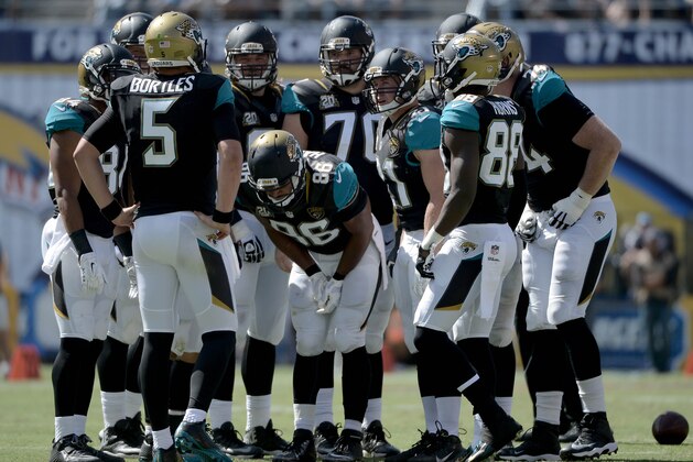 SAN DIEGO - SEPTEMBER 28:  Starting quarterback Blake Bortles #5 of the Jacksonville Jaguars calls a play in the huddle against the San Diego Chargers during an NFL game at Qualcomm Stadium on September 28, 2014 in San Diego, California. (Photo by Donald Miralle/Getty Images)