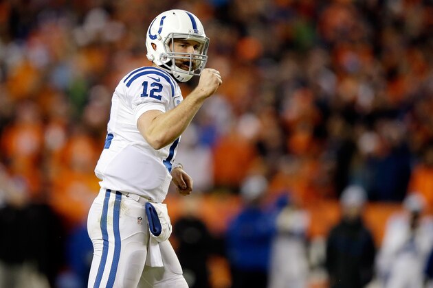 DENVER, CO - JANUARY 11:  Andrew Luck #12 of the Indianapolis Colts pumps his fist to celebrate a play against the Denver Broncos during a 2015 AFC Divisional Playoff game at Sports Authority Field at Mile High on January 11, 2015 in Denver, Colorado.  (Photo by Ezra Shaw/Getty Images)