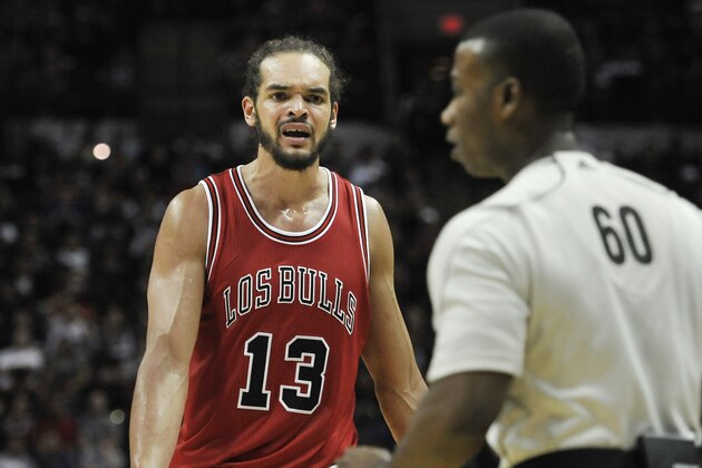 Chicago Bulls center Joakim Noah, left, argues a call with referee James Williams during the second half of an NBA basketball game against the San Antonio Spurs, Sunday, March 8, 2015, in San Antonio. San Antonio won 116-105. (AP Photo/Darren Abate).