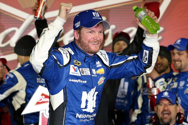 DAYTONA BEACH, FL - FEBRUARY 19:  Dale Earnhardt Jr., driver of the #88 Nationwide Chevrolet, celebrates in victory lane after winning the NASCAR Sprint Cup Series Budweiser Duel 1 at Daytona International Speedway on February 19, 2015 in Daytona Beach, Florida.  (Photo by Patrick Smith/Getty Images)