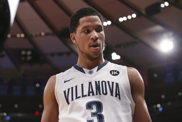 Villanova Wildcats guard Josh Hart (3) returns to the bench on a substitution in the second half of an NCAA college basketball game against Marquette in the quarterfinals of the Big East Conference tournament, Thursday, March 12, 2015, in New York. Villanova won, 84-49. (AP Photo/John Minchillo)