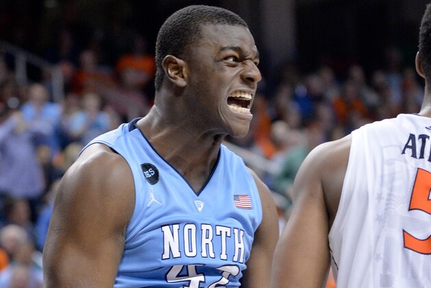 GREENSBORO, NC - MARCH 13:  Joel James #42 of the North Carolina Tar Heels reacts after a play against the Virginia Cavaliers during the semifinals of the 2015 ACC Basketball Tournament at Greensboro Coliseum on March 13, 2015 in Greensboro, North Carolina.  (Photo by Grant Halverson/Getty Images)