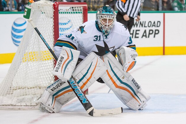 Feb 19, 2015; Dallas, TX, USA; San Jose Sharks goalie Antti Niemi (31) faces the Dallas Stars attack during the second period at the American Airlines Center. Niemi makes 37 saves is named number two star. The Sharks defeated the Stars 5-2. Mandatory Credit: Jerome Miron-USA TODAY Sports