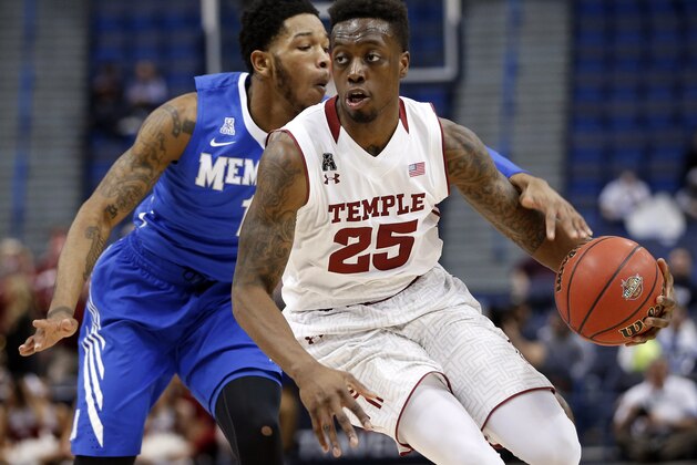 Mar 13, 2015; Hartford, CT, USA; Temple Owls guard Quenton DeCosey (25) drives the ball against Memphis Tigers guard Markel Crawford (1) in the first half during the quarterfinal round of the American Conference Tournament at XL Center. Mandatory Credit: David Butler II-USA TODAY Sports
