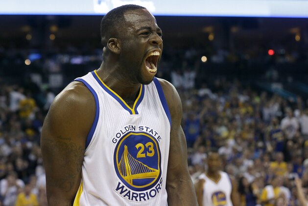 Golden State Warriors forward Draymond Green (23) yells after scoring against the Los Angeles Clippers during the second half of an NBA basketball game in Oakland, Calif., Sunday, March 8, 2015. The Warriors won 106-98. (AP Photo/Jeff Chiu)