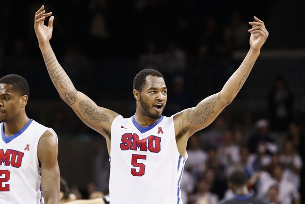 SMU's Markus Kennedy (5) celebrates his team 's basket against Tulsa during the second half of an NCAA college basketball game, Sunday, March 8, 2015, in Dallas. SMU won 67-62. (AP Photo/Jim Cowsert)