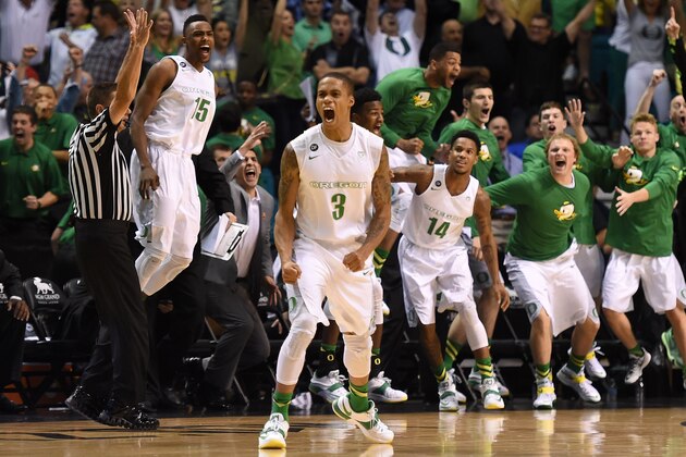 LAS VEGAS, NV - MARCH 13:  Joseph Young #3 of the Oregon Ducks reacts in front of his bench after he hit a game-winning 3-pointer in a semifinal game of the Pac-12 Basketball Tournament against the Utah Utes at the MGM Grand Garden Arena on March 13, 2015 in Las Vegas, Nevada. Oregon won 67-64.  (Photo by Ethan Miller/Getty Images)