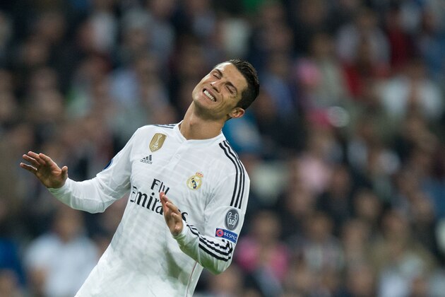 MADRID, SPAIN - MARCH 10: Cristiano Ronaldo of Real Madrid CF reacts as he fail to score during the UEFA Champions League round of 16 second leg match between Real Madrid CF and FC Schalke 04 at Estadio Santiago Bernabeu on March 10, 2015 in Madrid, Spain.  (Photo by Gonzalo Arroyo Moreno/Getty Images)