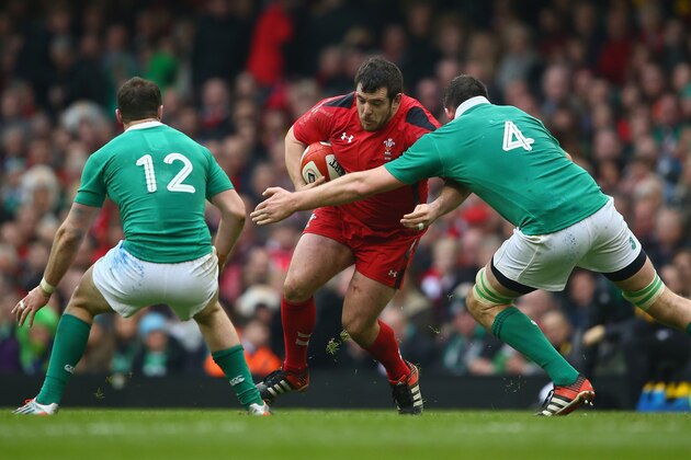 CARDIFF, WALES - MARCH 14: Aaron Jarvis (C)  of Wales cuts between Robbie Henshaw (L) and Devin Toner (R) of Ireland during the RBS Six Nations match between Wales and Ireland at the Millennium Stadium on March 14, 2015 in Cardiff, Wales.  (Photo by Michael Steele/Getty Images)