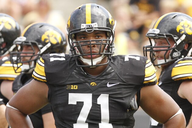 IOWA CITY, IOWA- SEPTEMBER 7:  Defensive lineman Carl Davis #71 of the Iowa Hawkeyes during a break in the action in the fourth quarter against the Missouri State Bears on September 7, 2013 at Kinnick Stadium in Iowa City, Iowa. Iowa won 28-14. (Photo by Matthew Holst/Getty Images)
