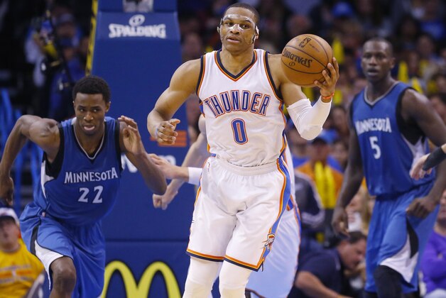 Oklahoma City Thunder guard Russell Westbrook (0) takes the ball up the court during an NBA basketball game between the Minnesota Timberwolves and the Oklahoma City Thunder in Oklahoma City, Friday, March 13, 2015. Oklahoma City won 113-99. (AP Photo/Sue Ogrocki)