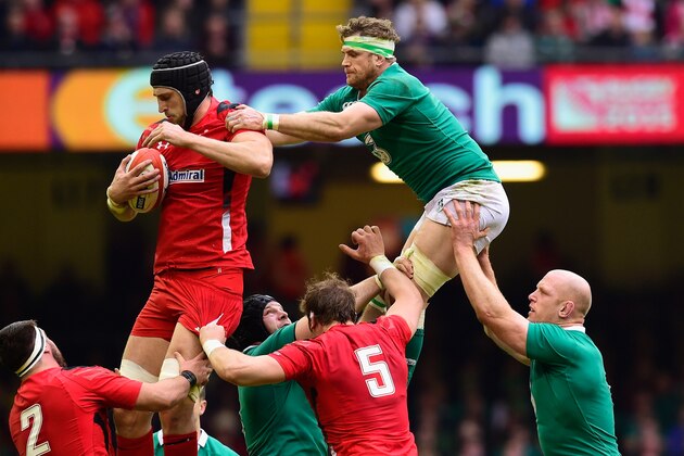 CARDIFF, WALES - MARCH 14:  Ireland player Jamie Heaslip is beaten in the line up by Luke Charteris of Wales during the RBS Six Nations match between Wales and Ireland at Millennium Stadium on March 14, 2015 in Cardiff, Wales.  (Photo by Stu Forster/Getty Images)