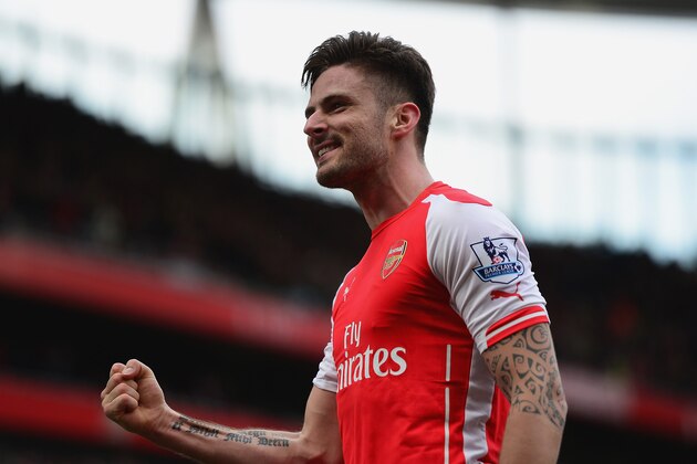 LONDON, ENGLAND - MARCH 14:  Olivier Giroud of Arsenal celebrates scoring the opening goal during the Barclays Premier League match between Arsenal and West Ham United at Emirates Stadium on March 14, 2015 in London, England.  (Photo by Jamie McDonald/Getty Images)