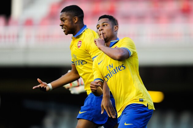 BARCELONA, SPAIN - MARCH 18:  Serge Gnabry (R) of Arsenal celebrates scoring a goal with team-mate Chuba Akpom during the UEFA Youth League Quarter Final match between Barcelona U19 and Arsenal U19 Mini Estadi on March 18, 2014 in Barcelona, Spain.  (Photo by David Ramos/Getty Images)