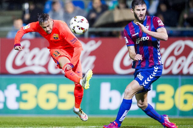 EIBAR, SPAIN - MARCH 14:  Neymar of FC Barcelona duels for the ball with Raul Rodriguez Navas of SD Eibar during the La Liga match between SD Eibar and FC Barcelona at Ipurua Municipal Stadium on March 14, 2015 in Eibar, Spain.  (Photo by Juan Manuel Serrano Arce/Getty Images)