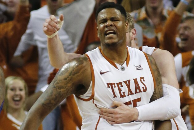 AUSTIN, TX - MARCH 7: Cameron Ridley #55 of the Texas Longhorns reacts after a slam dunk against the Kansas State Wildcats at the Frank Erwin Center on March 2, 2015 in Austin, Texas. (Photo by Chris Covatta/Getty Images)