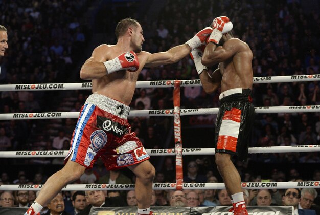 Mar 14, 2015; Montreal, Quebec, CAN; Jean Pascal (black trunks) fights Sergey Kovalev (red trunks) during their light heavyweight championship bout at the Bell Centre. Mandatory Credit: Eric Bolte-USA TODAY Sports