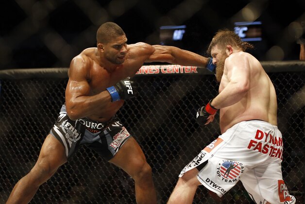 Mar 14, 2015; Dallas, TX, USA; Roy Nelson (red) fights Alistair Overeem (blue) in a heavyweight bout during UFC 185 at American Airlines Center. Mandatory Credit: Tim Heitman-USA TODAY Sports
