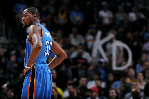 DENVER, CO - FEBRUARY 9: Kevin Durant #35 of the Oklahoma City Thunder stands on the court during a game against the Denver Nuggets on February 9, 2015 at Pepsi Center in Denver, Colorado. NOTE TO USER: User expressly acknowledges and agrees that, by downloading and or using this Photograph, user is consenting to the terms and conditions of the Getty Images License Agreement. Mandatory Copyright Notice: Copyright 2015 NBAE (Photo by Garrett Ellwood/NBAE via Getty Images