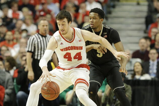 Wisconsin's Frank Kaminsky (44) is defended by Purdue's Basil Smotherman (5) in the first half of an NCAA college basketball game in the semifinals of the Big Ten Conference tournament in Chicago, Saturday, March 14, 2015.  (AP Photo/Nam Y. Huh)