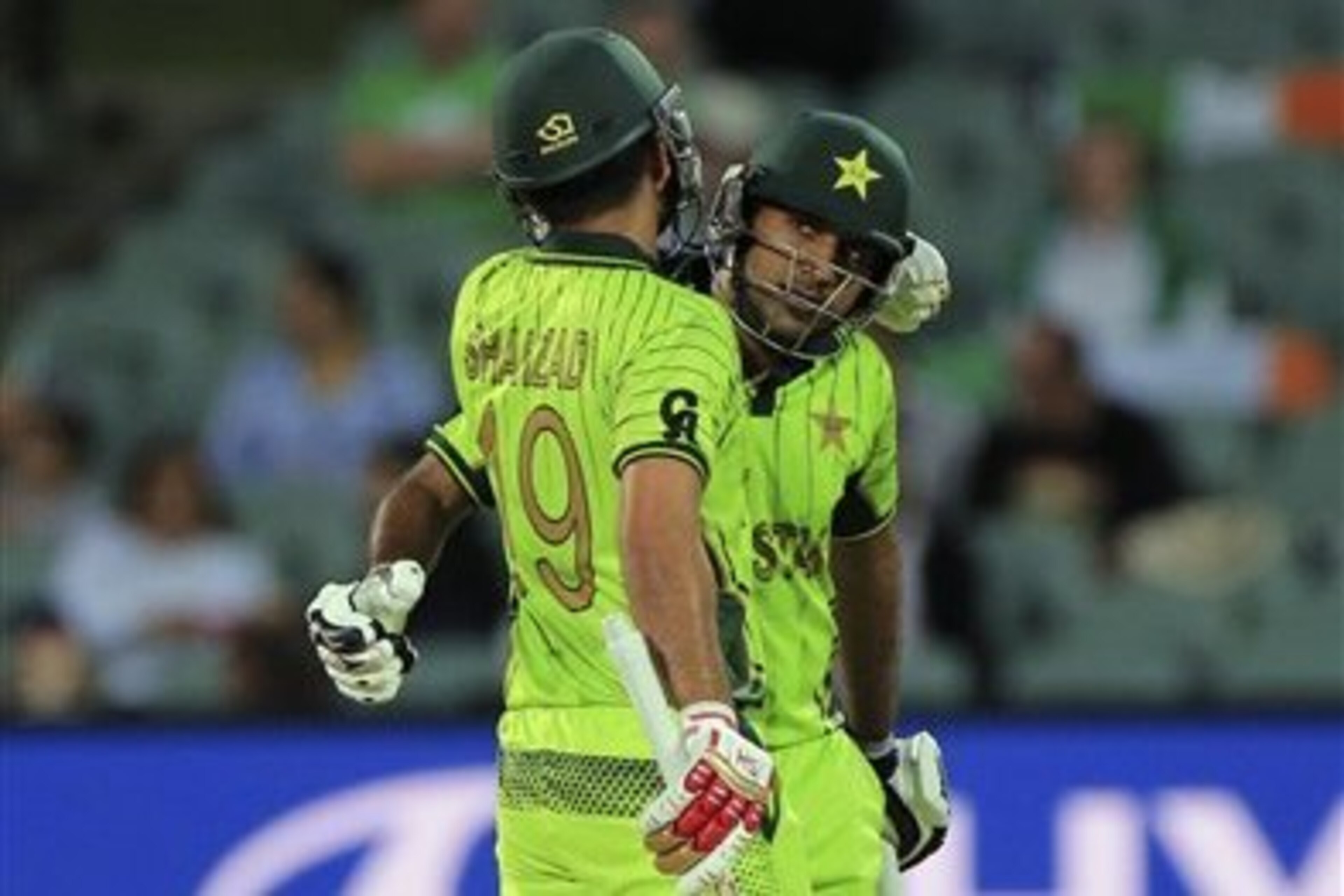 Pakistan’s Sarfraz Ahmed, right is congratulated by teammate Ahmed Shahzad, for his fifty runs during their Cricket World Cup Pool B match against Ireland in Adelaide, Australia, Sunday, March 15, 2015. (AP Photo/James Elsby) Pakistan’s Sarfraz Ahmed, right is congratulated by teammate Ahmed Shahzad, for his fifty runs during their Cricket World Cup Pool B match against Ireland in Adelaide, Australia, Sunday, March 15, 2015. (AP Photo/James Elsby)