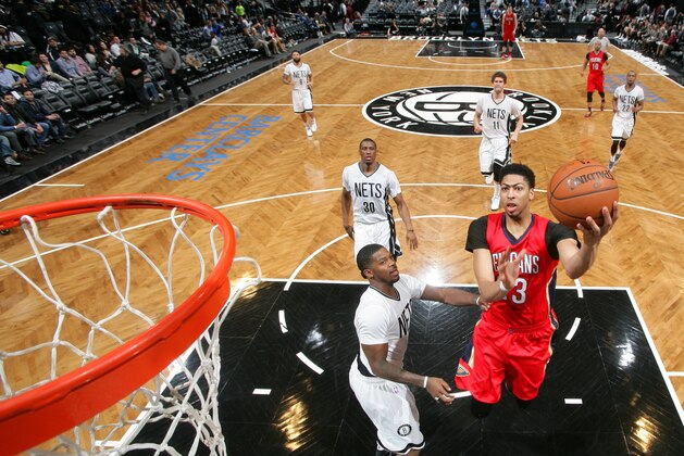 NEW YORK, NY - MARCH 10: Anthony Davis #23 of the New Orleans Pelicans shoots against the Brooklyn Nets on March 10, 2015 at the Barclays Center in the Brooklyn borough of New York City. NOTE TO USER: User expressly acknowledges and agrees that, by downloading and or using this Photograph, user is consenting to the terms and conditions of the Getty Images License Agreement. Mandatory Copyright Notice: Copyright 2015 NBAE (Photo by Nathaniel S. Butler/NBAE via Getty Images)