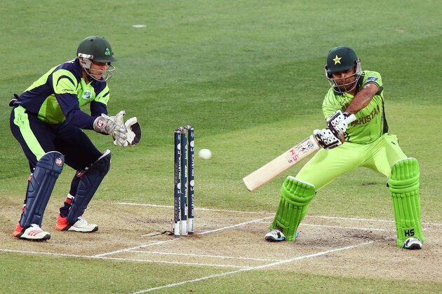 ADELAIDE, AUSTRALIA - MARCH 15: Sarfaraz Ahmed of Pakistan bats in front of Gary Wilson of Ireland during the 2015 ICC Cricket World Cup match between Pakistan and Ireland at Adelaide Oval on March 15, 2015 in Adelaide, Australia.  (Photo by Morne de Klerk/Getty Images)