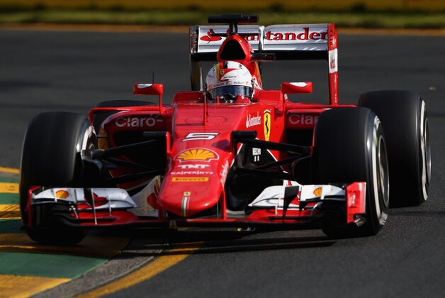 MELBOURNE, AUSTRALIA - MARCH 15:  Sebastian Vettel of Germany and Ferrari drives during the Australian Formula One Grand Prix at Albert Park on March 15, 2015 in Melbourne, Australia.  (Photo by Robert Cianflone/Getty Images)