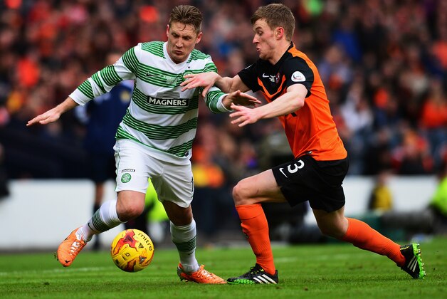 GLASGOW, SCOTLAND - MARCH 15:  Paul Dixon of Dundee United closes down Kris Commons of Celtic during the Scottish League Cup Final between Dundee United and Celtic at Hampden Park on March 15, 2015 in Glasgow, Scotland.  (Photo by Mark Runnacles/Getty Images)
