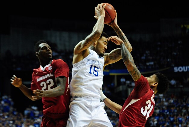 Mar 15, 2015; Nashville, TN, USA; Kentucky Wildcats forward Willie Cauley-Stein (15) fights for possession with Arkansas Razorbacks forward Jacorey Williams (22) and Arkansas Razorbacks guard Anton Beard (31) during the first half of the SEC Conference championship game at Bridgestone Arena. Mandatory Credit: Joshua Lindsey-USA TODAY Sports