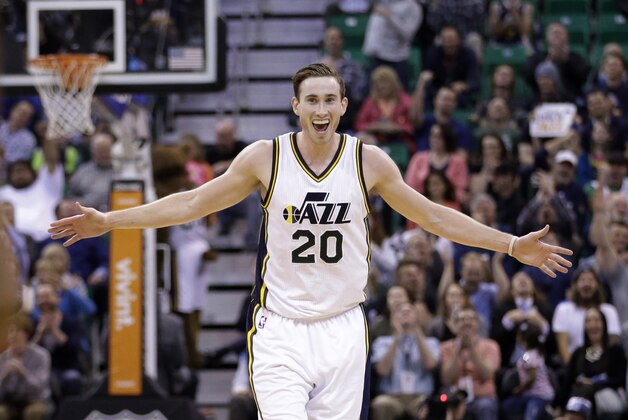 Utah Jazz forward Gordon Hayward celebrates after a teammate scored in the third quarter of an NBA basketball game against the Houston Rockets, Thursday, March 12, 2015, in Salt Lake City. The Jazz won 109-91. (AP Photo/Rick Bowmer)