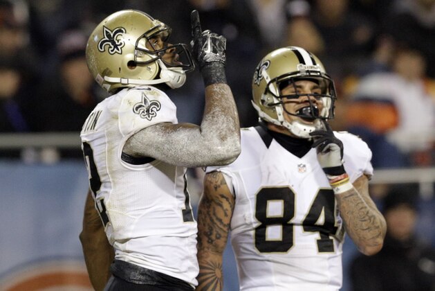 New Orleans Saints wide receiver Marques Colston (12) celebrates a touchdown with wide receiver Kenny Stills (84) during the first half of an NFL football game Monday, Dec. 15, 2014, in Chicago. (AP Photo/Nam Y. Huh)