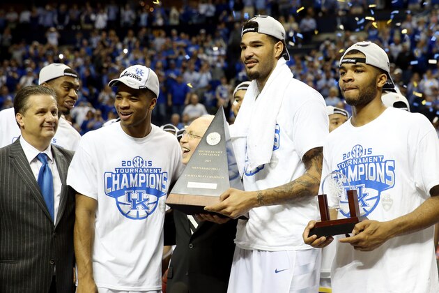 NASHVILLE, TN - MARCH 15:  Willie Cauley-Stein #15 of the Kentucky Wildcats celebrates with the trophy on the court with his teammates after defeating the Arkansas Razorbacks 78-63 in the championship game of the SEC basketball tournament at Bridgestone Arena on March 15, 2015 in Nashville, Tennessee.  (Photo by Andy Lyons/Getty Images)