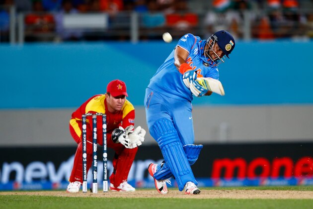 AUCKLAND, NEW ZEALAND - MARCH 14:  Suresh Raina of India bats during the 2015 ICC Cricket World Cup match between India and Zimbabwe at Eden Park on March 14, 2015 in Auckland, New Zealand.  (Photo by Phil Walter/Getty Images)