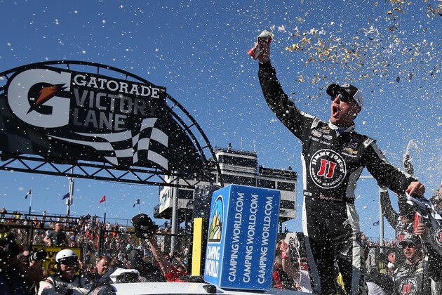 AVONDALE, AZ - MARCH 15:  Kevin Harvick, driver of the #4 Jimmy John's/ Budweiser Chevrolet, celebrates in victory lane after winning the NASCAR Sprint Cup Series CampingWorld.com 500 at Phoenix International Raceway on March 15, 2015 in Avondale, Arizona.  (Photo by Chris Graythen/Getty Images)