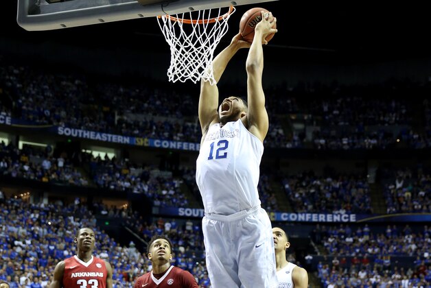 NASHVILLE, TN - MARCH 15:  Karl-Anthony Towns #12 of the Kentucky Wildcats dunks against the Arkansas Razorbacks during the championship game of the SEC basketball tournament at Bridgestone Arena on March 15, 2015 in Nashville, Tennessee.  (Photo by Andy Lyons/Getty Images)