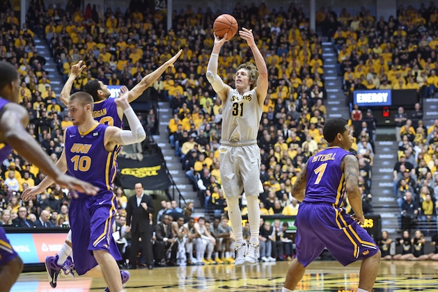 WICHITA, KS - FEBRUARY 28:  Guard Ron Baker #31 of the Wichita State Shockers hits a three point shot against the Northern Iowa Panthers during the first half on February 28, 2015 at Charles Koch Arena in Wichita, Kansas.  (Photo by Peter Aiken/Getty Images)