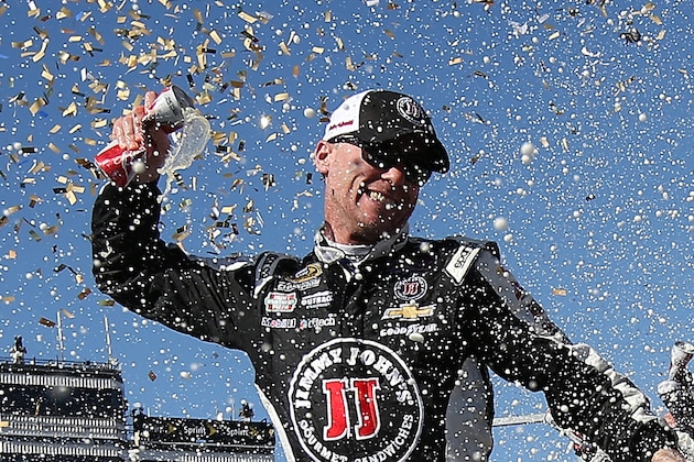 AVONDALE, AZ - MARCH 15:  Kevin Harvick, driver of the #4 Jimmy John's/ Budweiser Chevrolet, celebrates in victory lane after winning the NASCAR Sprint Cup Series CampingWorld.com 500 at Phoenix International Raceway on March 15, 2015 in Avondale, Arizona.  (Photo by Chris Graythen/Getty Images)