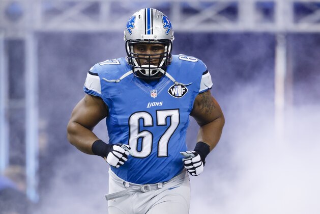 Detroit Lions guard Rob Sims (67) during player introductions before an NFL football game against the Miami Dolphins at Ford Field in Detroit, Sunday, Nov. 9, 2014. (AP Photo/Rick Osentoski)