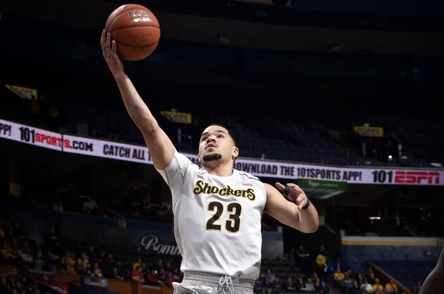 Mar 6, 2015; St. Louis, MO, USA; Wichita State Shockers guard Fred VanVleet (23) goes up for a layup against the Southern Illinois Salukis during the first round of the Missouri Valley Conference Tournament at Scottrade Center. Mandatory Credit: Scott Rovak-USA TODAY Sports