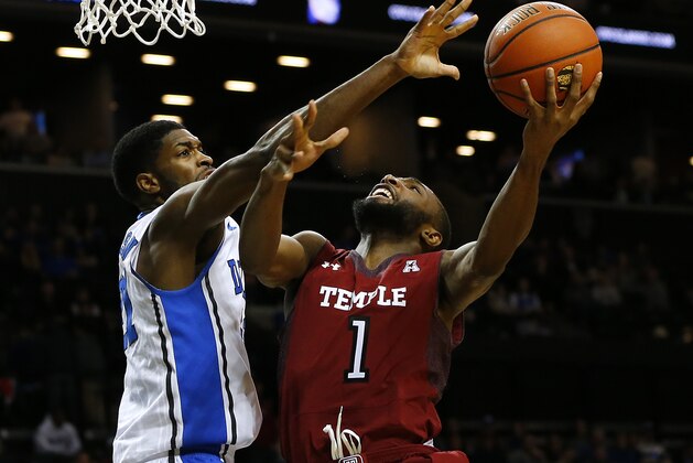 NEW YORK, NY - NOVEMBER 21: Josh Brown #1 of the Temple Owls looks for a shot as Amile Jefferson #21 of the Duke Blue Devils defends in the second half in the Coaches vs Cancer Classic men's basketball tournament at Barclays Center on November 21, 2014 in the Brooklyn borough of New York City. (Photo by Rich Schultz /Getty Images)