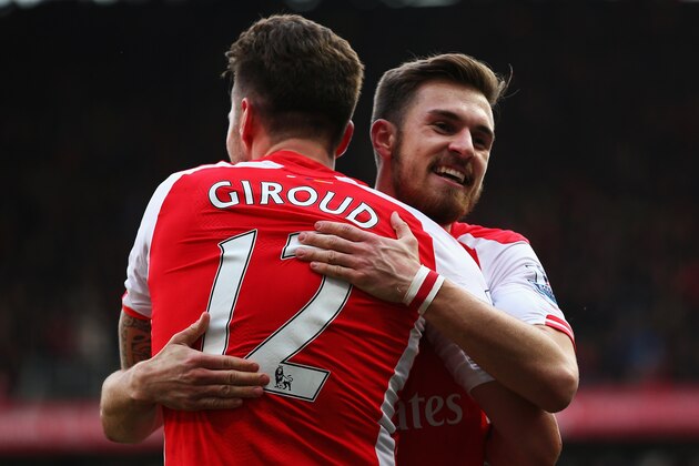 LONDON, ENGLAND - MARCH 14: Aaron Ramsey of Arsenal celebrates his goal with Olivier Giroud of Arsenal during the Barclays Premier League match between Arsenal and West Ham United at Emirates Stadium on March 14, 2015 in London, England.  (Photo by Ian Walton/Getty Images)
