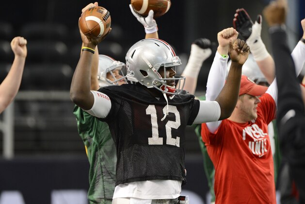Jan 10, 2015; Arlington, TX, USA; Ohio State Buckeyes quarterback Cardale Jones (12) during practice in preparation for the CFP National Championship at AT&T Stadium. Mandatory Credit: Tommy Gilligan-USA TODAY Sports