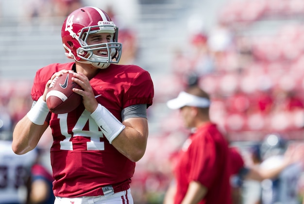 Sep 6, 2014; Tuscaloosa, AL, USA; Alabama Crimson Tide quarterback Jake Coker (14) warms up prior to the game against the Florida Atlantic Owls at Bryant-Denny Stadium. Mandatory Credit: Marvin Gentry-USA TODAY Sports