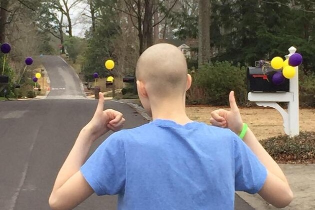 Fifteen-year-old LSU fan Sid Ortis, who lives in Mountain Brook, Alabama, and has a rare form of cancer, came home to a sea of purple and gold balloons after his latest surgery.