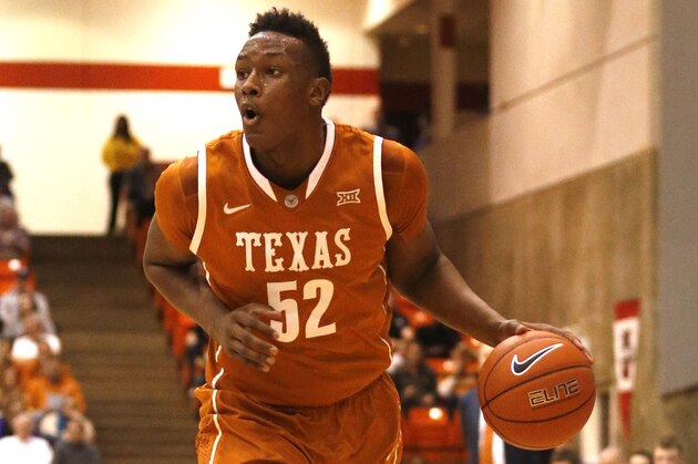 Jan 19, 2015; Fort Worth, TX, USA; Texas Longhorns forward Myles Turner (52) dribbles the ball against the TCU Horned Frogs in the first half at Wilkerson-Greines Athletic Center. Texas beat  TCU 66-48. Mandatory Credit: Tim Heitman-USA TODAY Sports