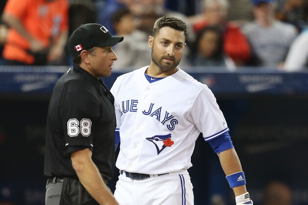 TORONTO, CANADA - SEPTEMBER 12: Kevin Pillar #11 of the Toronto Blue Jays reacts after being called out on strikes by home plate umpire Chris Guccione #68 in the fourth inning during MLB game action against the Tampa Bay Rays on September 12, 2014 at Rogers Centre in Toronto, Ontario, Canada. (Photo by Tom Szczerbowski/Getty Images)