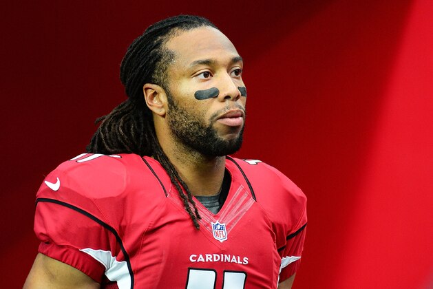 GLENDALE, AZ - DECEMBER 07:  Wide receiver Larry Fitzgerald #11 of the Arizona Cardinals gets ready to take the field prior to the NFL game against the Kansas City Chiefs at University of Phoenix Stadium on December 7, 2014 in Glendale, Arizona.  (Photo by Jennifer Stewart/Getty Images)