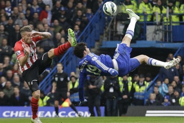 FILE - In this Sunday, March 15, 2015 file photo Chelsea's Diego Costa, right, competes for the ball with Southampton's Toby Alderweireld, during the English Premier League soccer match between Chelsea and Southampton at Stamford Bridge stadium in London.  (AP Photo/Matt Dunham, File)